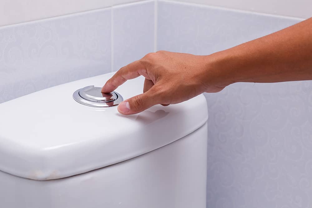How to fix a toilet flush button [A guide] Bromley Plumbers